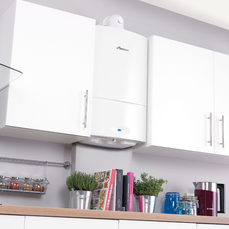Worcester Bosch boiler neatly installed in a cupboard by AmberHeat Boilers